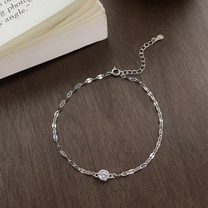 Sparkling S925 sterling silver bracelet featuring a round zircon and embossed link chain