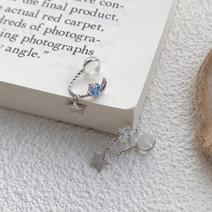 S925 sterling silver asymmetrical star and moon earrings with blue gemstone accents