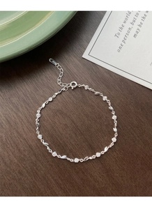 Detailed macro shot of S925 sterling silver rose flower bracelet with elegant lobster clasp