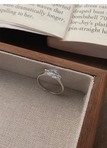 Macro shot of S925 sterling silver ring featuring a sparkling marquise cut cubic zirconia