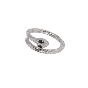 Adjustable snake-shaped silver ring with sparkling crystal pave head and black gem eyes