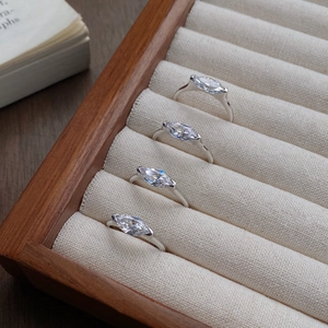 Exquisite S925 sterling silver marquise cut zircon ring displayed on a velvet jewelry tray