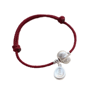 Red woven bracelet with silver Fortune pouch and Joy tag for Year of the Snake