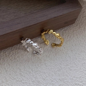 Minimalist S925 sterling silver heart open rings in gold and silver finish on wood