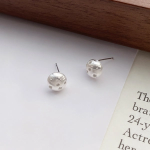 Minimalist S925 sterling silver starburst round stud earrings with brushed metal finish