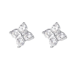 Elegant S999 silver four-leaf clover star stud earrings with sparkling zircon stones