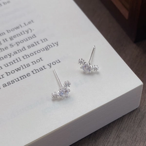 Elegant S999 sterling silver stud earrings with sparkling round cubic zirconia stones