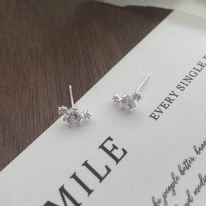 Elegant S999 sterling silver stud earrings featuring sparkling round cubic zirconia stones