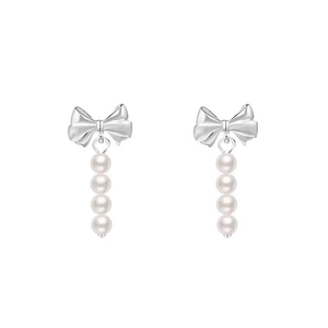 Elegant S925 silver bow earrings with cascading white pearls on a clean white background