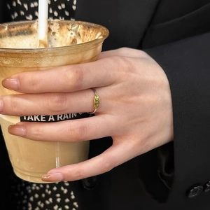 Minimalist S925 sterling silver two-tone ring with hammered gold texture on model