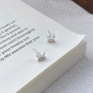 Minimalist S999 sterling silver rocking horse stud earrings with polished mirror finish