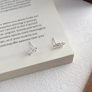 Elegant S999 sterling silver swallow stud earrings with abstract flying bird wing design