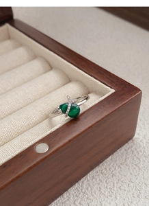 Macro detail of S925 silver ring featuring green chalcedony and pavé zircon accents