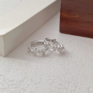 Elegant S925 sterling silver floral hoop earrings featuring small zircon daisies