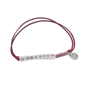 Red woven S999 silver bracelet featuring engraved mantra tube and classic round charm