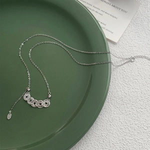 S925 sterling silver necklace with textured five-emperor coins and tassel design