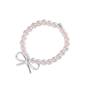 Elastic S925 silver beaded ring with light pink pearls and a sleek metal bow accent