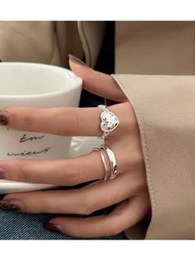 Close-up of S925 silver heart ring with hammer texture and minimalist double band ring