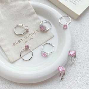 Elegant S925 sterling silver ring set with pink zircon stones and adjustable open band