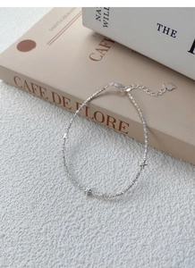 Detail of S925 sterling silver star bracelet with sandblast texture and adjustable clasp
