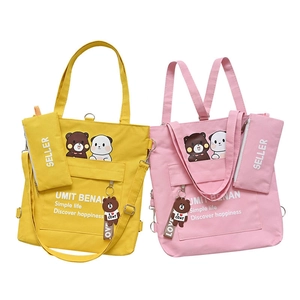 Versatile canvas tote bag for students featuring cartoon bear print and accessory pouch