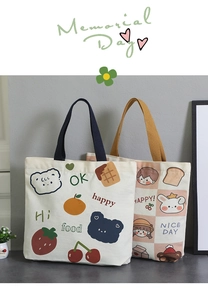 Detail of canvas lunch tote bag featuring cute cartoon animal and fruit illustrations
