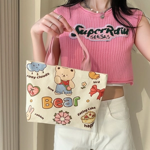 Mini off-white canvas tote bag with cute bear and rabbit prints and pink handles