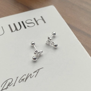 Elegant S999 sterling silver bowknot stud earrings with polished round beads for women