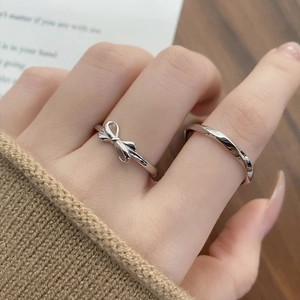 S925 sterling silver bow and mobius twist ring set for couples with polished finish