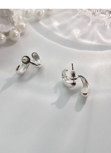 Close-up of S925 sterling silver drop U-shaped earrings with polished finish and pearls