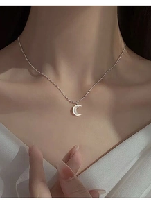 Close-up of S925 silver crescent moon necklace with mother of pearl inlay on model