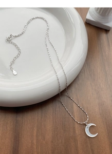 Detail view of S925 sterling silver moon necklace with mother of pearl and S925 hallmark
