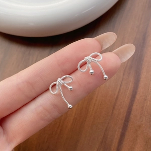 Elegant S925 sterling silver bow knot stud earrings with twist texture and small silver beads