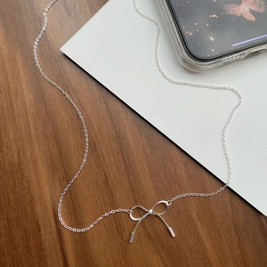 Elegant S925 sterling silver bow pendant necklace with minimalist silver chain for women