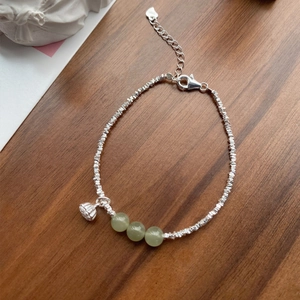 S925 sterling silver bracelet with lotus pod charm and green nephrite jade beads