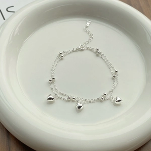Minimalist S925 sterling silver double-layer bracelet with polished heart charms and beads