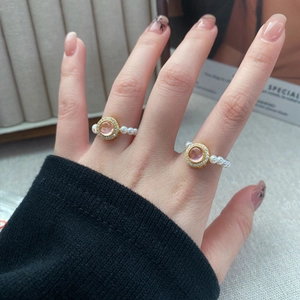 Elegant S925 silver elastic ring featuring pink gemstones and white pearls for women