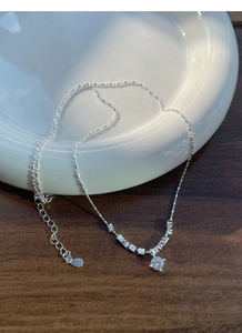 Detail showing S925 sterling silver beaded chain with cubic zirconia and silver nuggets