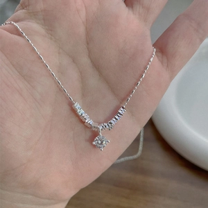Minimalist S925 silver necklace featuring a round solitaire pendant and faceted tube accents