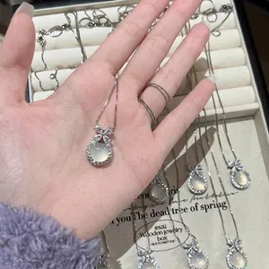 S925 sterling silver necklace with translucent chalcedony and bow knot pendant