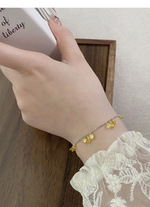 S925 sterling silver slider bracelet with yellow teardrop zircon on a female wrist