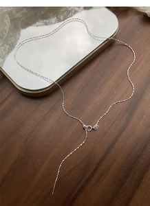 Detailed macro shot of S925 sterling silver necklace chain with spring clasp and hallmark