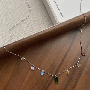 Elegant S925 sterling silver necklace with seven vibrant multi-colored crystal pendants