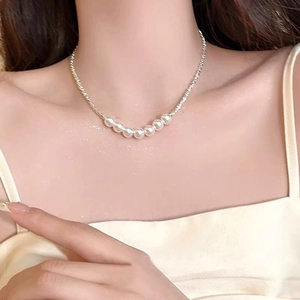 Elegant S925 sterling silver necklace with seven white pearls on a fine beaded chain