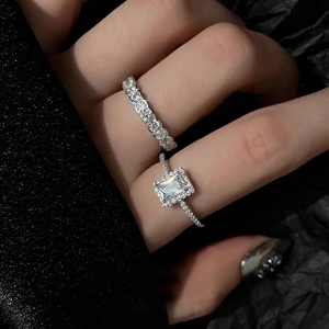 Sparkling S925 silver square zircon rings featuring a geometric halo and eternity band