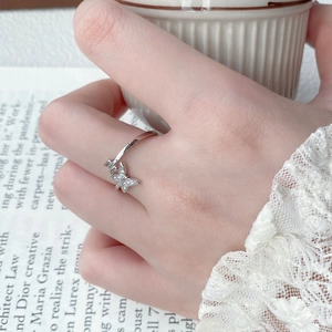 Elegant S925 sterling silver butterfly ring with sparkling zircon stones on a model's hand