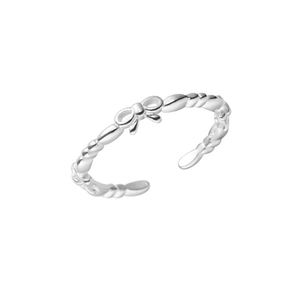 Elegant S925 sterling silver bow ring with adjustable twisted band on white background