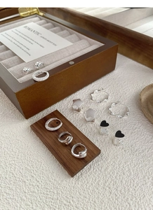 Detailed set of S925 silver earrings featuring star studs and enamel heart hoops