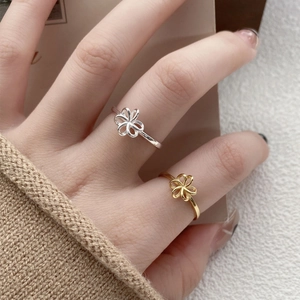 Elegant S925 sterling silver hollow flower rings in silver and gold finishes