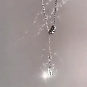 Minimalist S925 sterling silver bean pendant necklace with engraved Lucky square tag charm